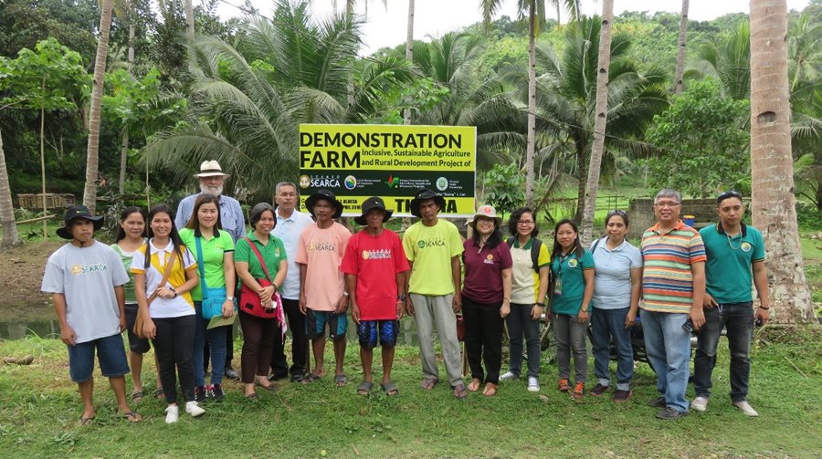 ISARD Growers, LGU Inopacan ISARD Team, VSU ISARD Team, and SEARCA ISARD Team in a Tilapia Fishpond Demonstration Farm with Dr. Friedhelm Göltenboth the father of rainforestation.