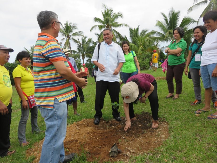 Ceremonial Tree Planting led by Dr. Bessie Burgos and Dr. Othello Capuno with Prof. Rolando Bello and the jackfruit growers.