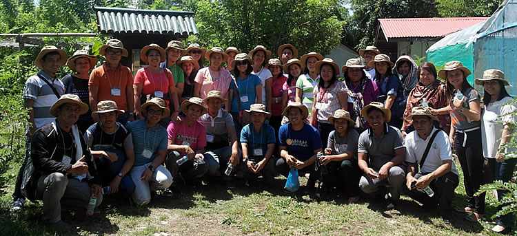Participants at the crop museum of IIRR, Silang, Cavite with Ms. Irish Baguilat