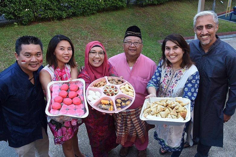 Ulu Pandan residents sharing desserts from different cultures. MPs such as Mr Christopher De Souza and Mr Gan Thiam Poh have noted how food can be a unifying experience across cultures.PHOTO: ULU PANDAN GRASSROOTS ORGANISATIONS