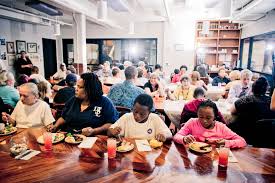The Asheville, North Carolina, nonprofit Green Opportunities hosts lunches and dinners for its community. Courtesy Green Opportunities