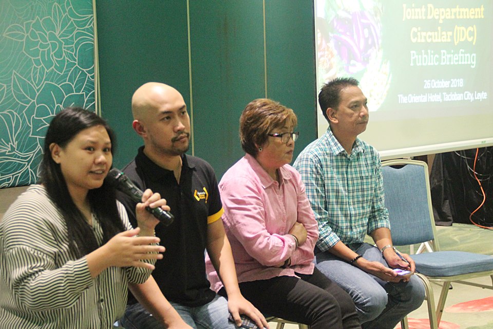 The panel addresses queries from the audience. From left: Ms. Zyrine Lorizo (DA-BPI), Mr. Charles Anthony Vega (DILG), Ms. Julieta Fe L. Estacio, Head Secretariat of the National Committee on Biosafety of the Philippines, and Engr. Rolando Santiago, Supervising Health Program Officer from DOH.