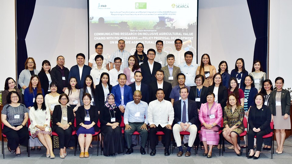 Organizers and participants of the back-to-back workshops with Ms. Aniq Fadhillah (seated fifth from left), Policy Facilitator, IFPRI-South Asia; Prof. Jimmy B. Williams, ATMI-ASEAN Project Support Unit (PSU) Coordinator; Dr. Fernando C. Sanchez, Jr. Chancellor, University of the Philippines Los Banos and Chair, SEARCA Governing Board (seated fifth from right); and Dr. Fabrizio Bresciani (seated fourth from right), Lead Regional Economist, IFAD-Asia and Pacific Division.