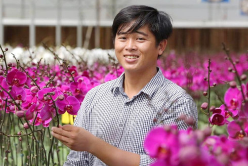 Phan Thanh Sang, the owner of YSA Orchid Farm, in one of his high-tech farms.